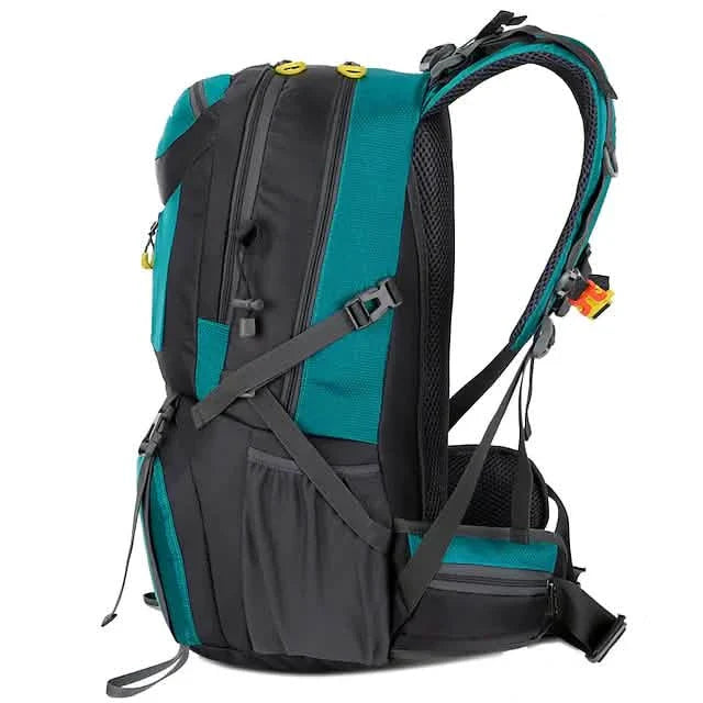 Teal and black backpack on a white background
