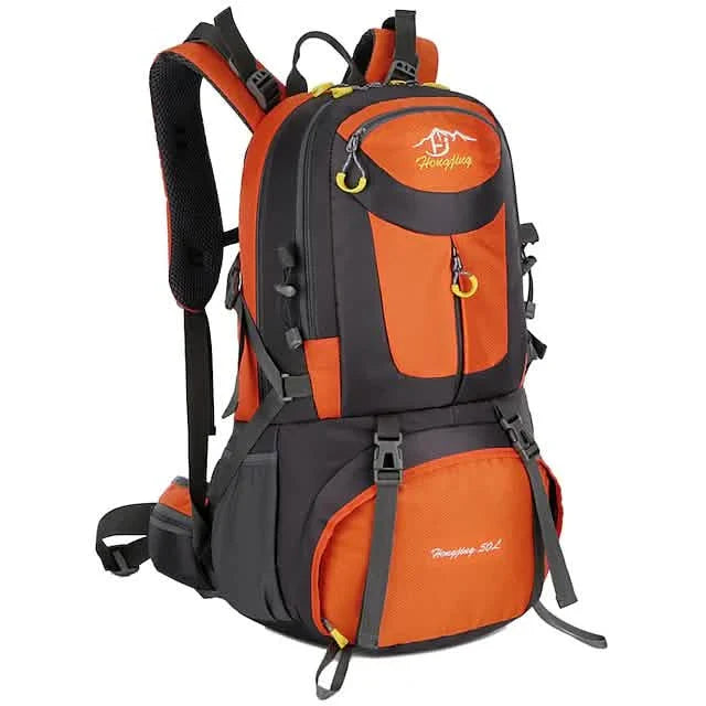 Orange and black backpack with visible brand logo on a white background