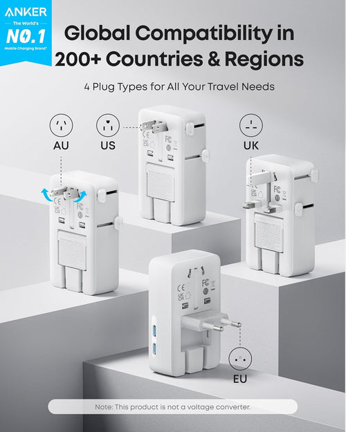 Anker travel adapter with plug types for global compatibility on a gray background