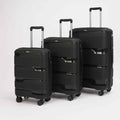 Three black suitcases of different sizes on a white background