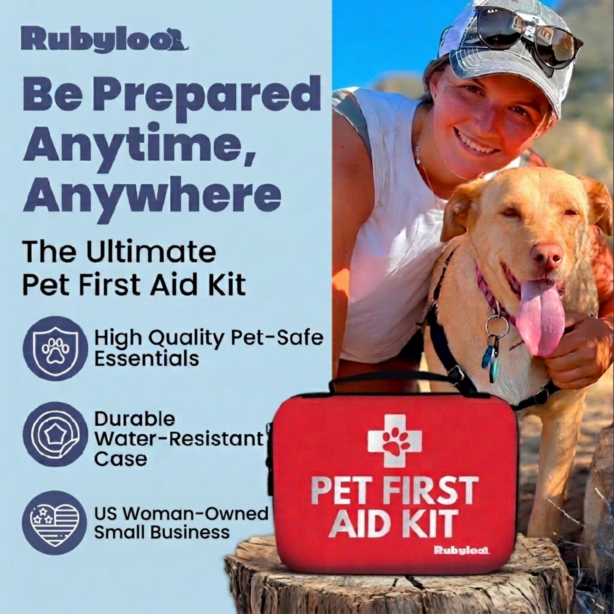 Woman holding a dog with a Rubyloo pet first aid kit on a beach.