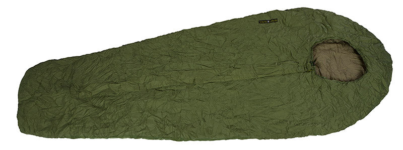 Green sleeping bag on a white background