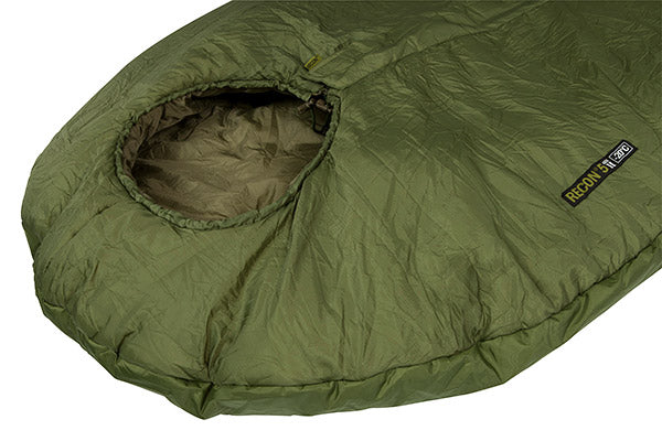 Green sleeping bag with a brand label on a white background