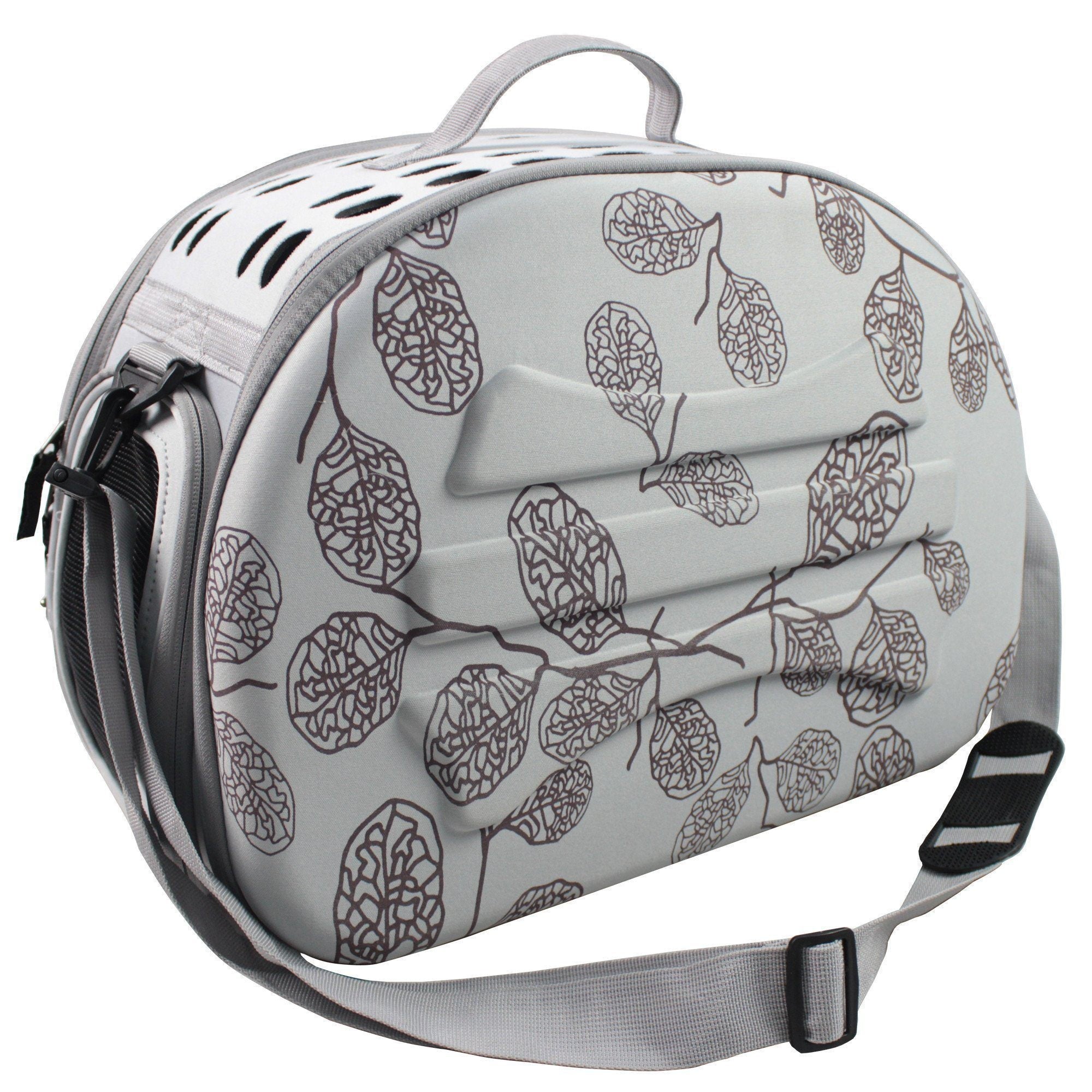 Pet carrier with leaf pattern on a white background