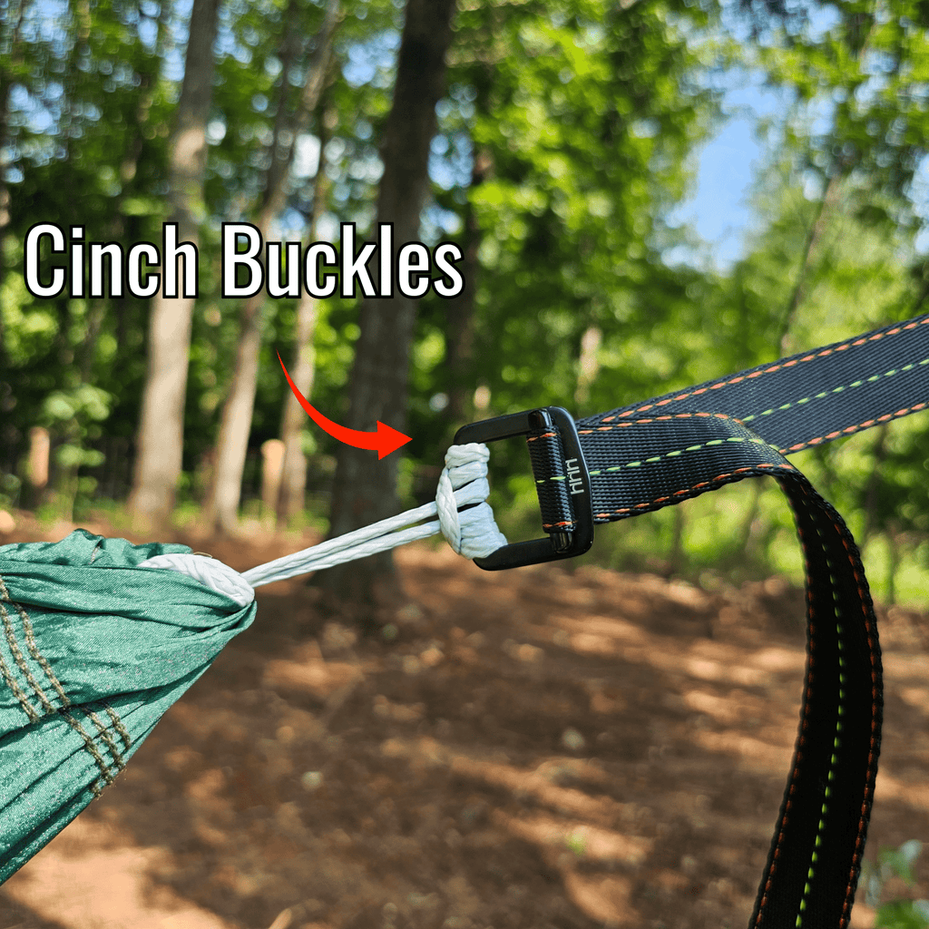 Cinch buckle on a hammock with trees in the background