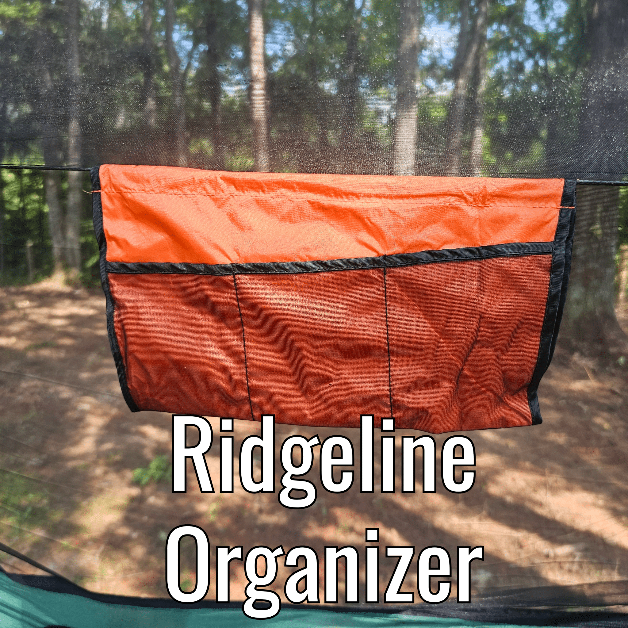 Orange Ridgeline Organizer hanging on a hammock with a forest background