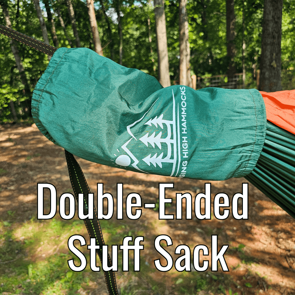 Green hammock stuff sack with Tree High Hammocks logo on a forest background